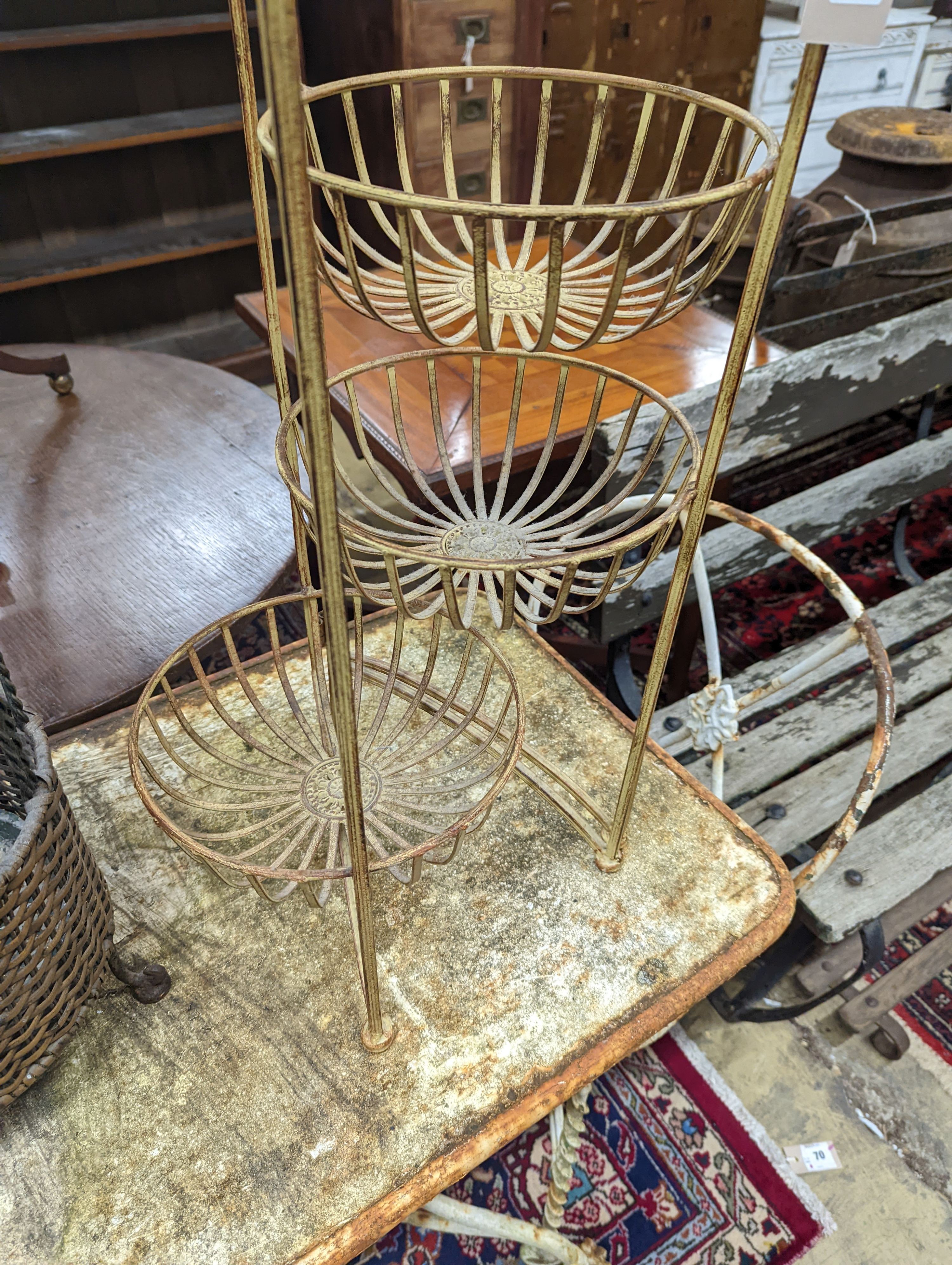 A rattan and wirework stick stand, height 63cm, together with one other folding stand